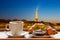 Coffee with croissants against Eiffel Tower in Paris, France