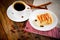 Coffee Cup with Apple Pie on Woody Background