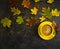 Coffee cup autumn seasons rustic comfort leaves on concrete background