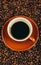 Coffee cup and beans background