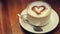 Coffee Cup with Cinnamon Hearth on the Foam