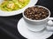 Coffee cup with coffee beans Cafe menu with spaghetti plate Food and drink