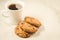 Coffee cup and cookies with chocolate/coffee cup and cookies with chocolate on a marble background, selective focus