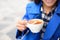 Coffee cup with foam shape - cafe woman drinking