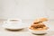 coffee cup and homemade cookies/Breakfast whith coffee cup and homemade cookies on a white table, selective focus