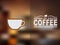 Coffee cup icon and text design with a blurred background.