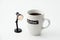 Coffee cup with little desk lamp