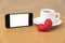 Coffee cup and phone and heart