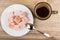 Coffee cup, rakhat-lukum on plate and spoon on table
