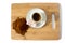 Coffee cup, rakhat-lukum on plate on wooden table
