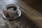 Coffee cup in a rustic wood table