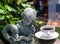 Coffee cup and Sculpture of angel