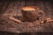 Coffee Cup Table Wood Grain coffee Side view Cinnamon stick Close-up.