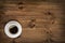 Coffee cup top view on wooden table background