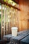 Coffee cup on a wooden table in the nature