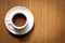 Coffee Cup on Wooden Table Surface