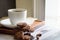 Coffee cups and chocolate chip baked cookies.