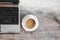 Coffee cups and laptops on the desk