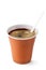 Coffee in disposable cup with plastic spoon