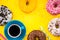 Coffee and donuts vibrant flat lay design