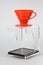 Coffee dripper with drip station