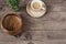 Coffee espresso, bonsai tree and bamboo bowls on a wooden table background. Dark wood. Empty place, copy space Morning in office.