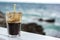 Coffee Frappe Fredo Iced with sea background