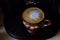 Coffee. Freshly made Flat White. Cappuccino coffee drink in a brown cup