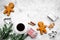 Coffee with gingebread cookies and gifts in christmas evening. Grey stone background top view copyspace