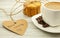 Coffee and ginger biscuits on a wooden background, hearty and healthy breakfast