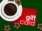 Coffee, gingerbread and gift card lying on tablecloth