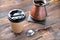 Coffee glass vintage coffee maker and a spoon in the background wooden background blur