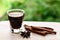 Coffee grass and spices on wooden tray.