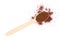 Coffee ground wooden spoon on a white background