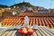 Coffee and Italian sweets with view to Bosa village, Sardinia, Italy