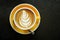 Coffee Latte leaf pattern face on black table