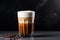 Coffee latte in a tall glass with coffee beans on a dark background, Coffee with milk in a glass on a gray background, AI