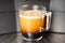 Coffee Machine Cup of fresh coffee closeup