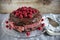 Coffee and milk chocolate ganache cake with raspberry jam