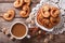 Coffee with milk and cookies Palmiers on the table. Horizontal t