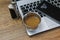 Coffee on modern laptop - ultrabook