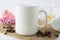 Coffee mug mockup with muffin