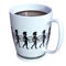 Coffee mug with spearmen border isolated on white