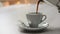Coffee pot pouring coffee