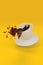 Coffee spilling out of a mug isolated on yellow background. 3d illustration