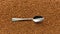 Coffee. Spoon with instant coffee, cutlery, breakfast, dry aromatic drink.