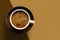 Coffee with swirl of milk or cream. Cup of morning drink, saucer on double diagonal background. Monochrome horizontal banner,