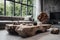 Coffee table made from wooden tree trunk against grey corner sofa. Tv on white wall and big windows