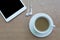 Coffee with tablet and headphones