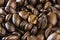 Coffee texture. Roasted coffee beans as background wallpaper.
